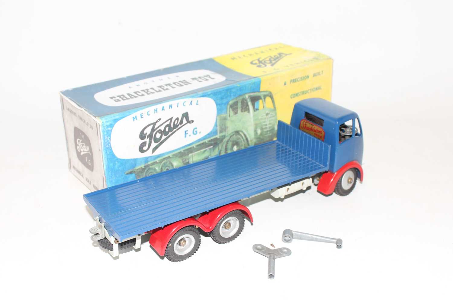 A Shackleton Toys model of a Foden FG flatbed lorry comprising of dark blue cab and back with red - Image 2 of 2