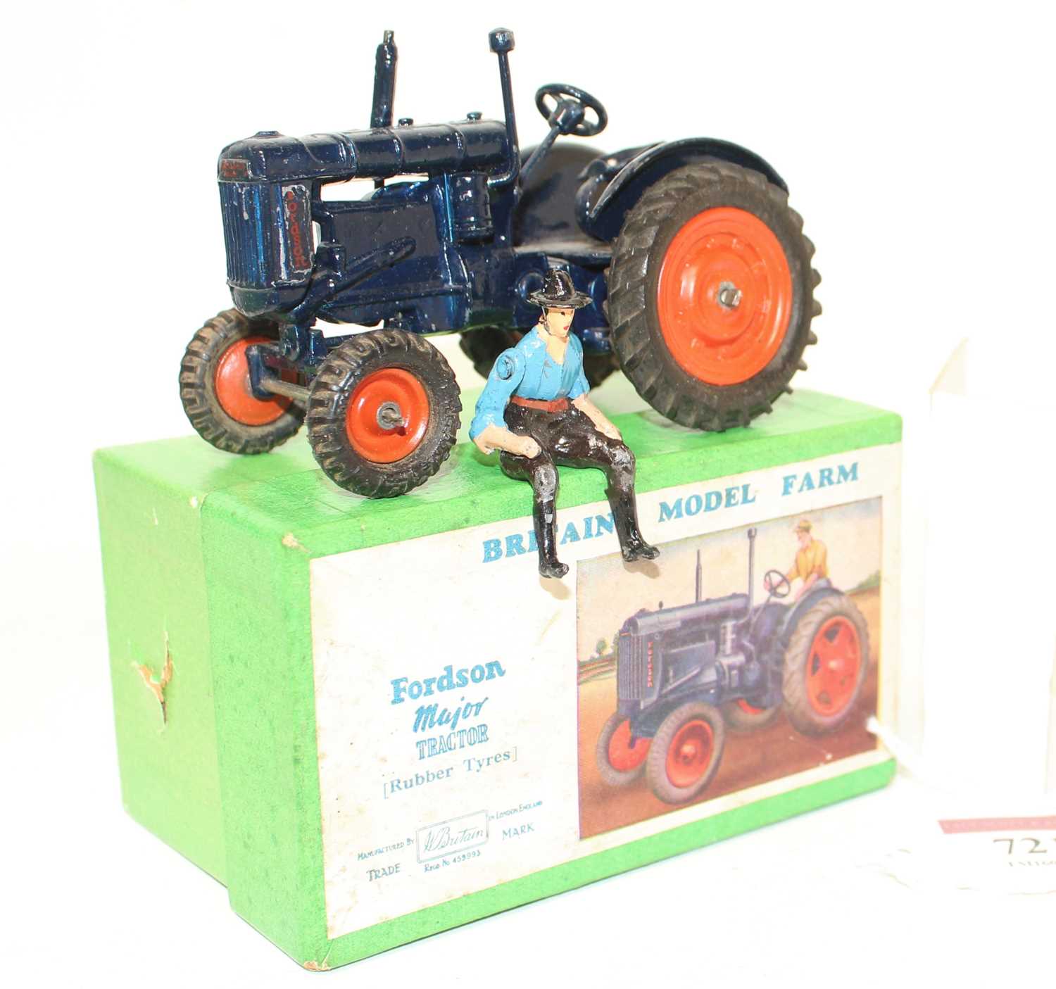 A Britains model No. 128F Fordson Major tractor comprising of dark blue body with orange hubs and