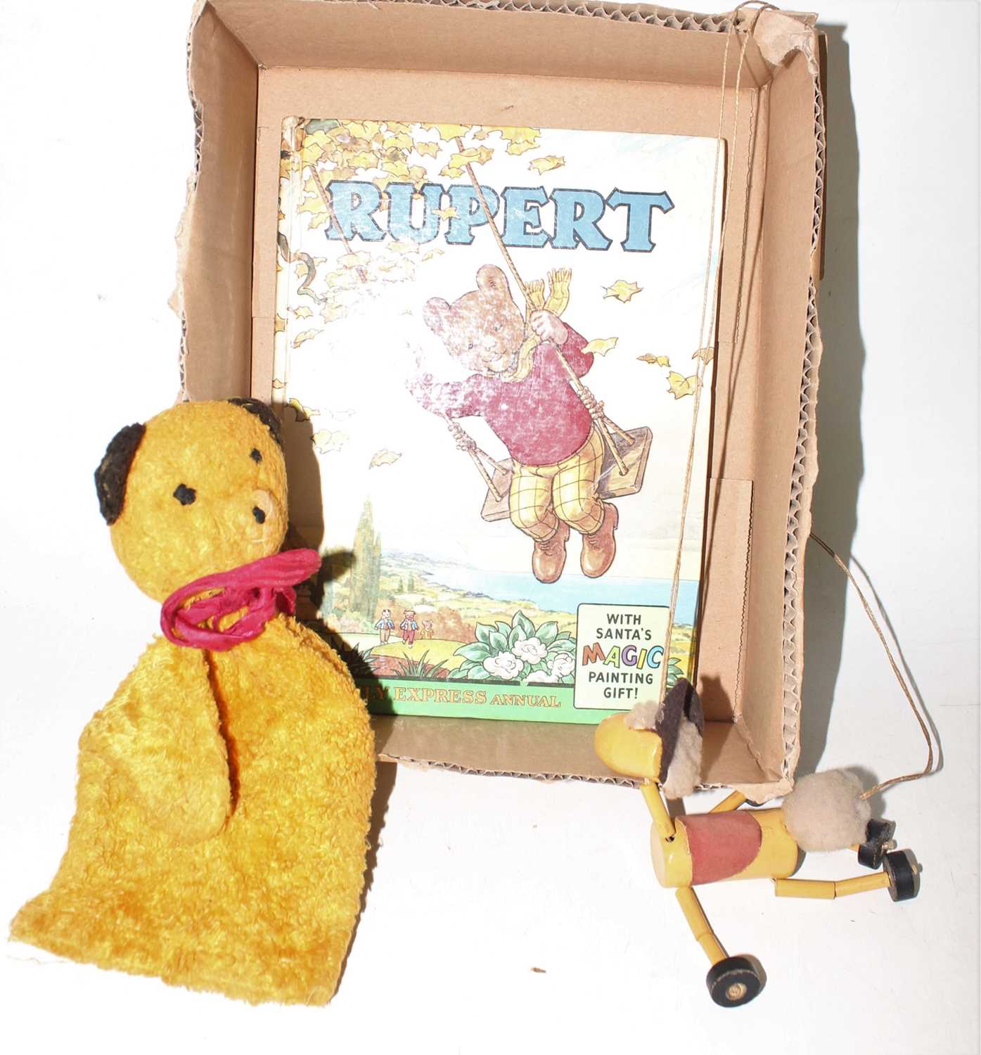A group of 3 items to include the following A Rupert the bear Daily Express annual of 1961 has