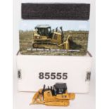 A diecast Masters Real Replicas, Highline Series 1/50 scale diecast model of a Caterpillar D7E track