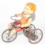 A Marx tinplate and clockwork model of a Wonder Cyclist comprising of Three wheeled trike fitted