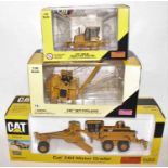 A Norscot 1/50 scale Caterpillar boxed diecast group, three examples to include a Caterpillar D6K XL