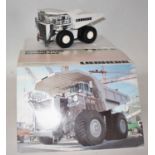 A Conrad Model No. 2727/0 1/50 scale diecast model of a Liebherr T282B mining truck, finished in
