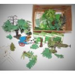 A quantity of Britains plastic trees unboxed plus 3 boxes of Farm Hedges and other items.(G-M)