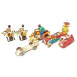 A collection of various loose tinplate and celluloid mixed vintage children's toys, examples to
