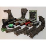 Plastic crate containing non-Hornby (? possibly JEP) tinplate electric 3-rail track (in need of