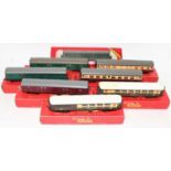 Tray containing eight Triang coaches and passenger train vehicles: R334 diesel centre car M59120 (