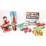 One box of mixed loose and boxed tinplate vehicles, novelty toys and accessories, to include a