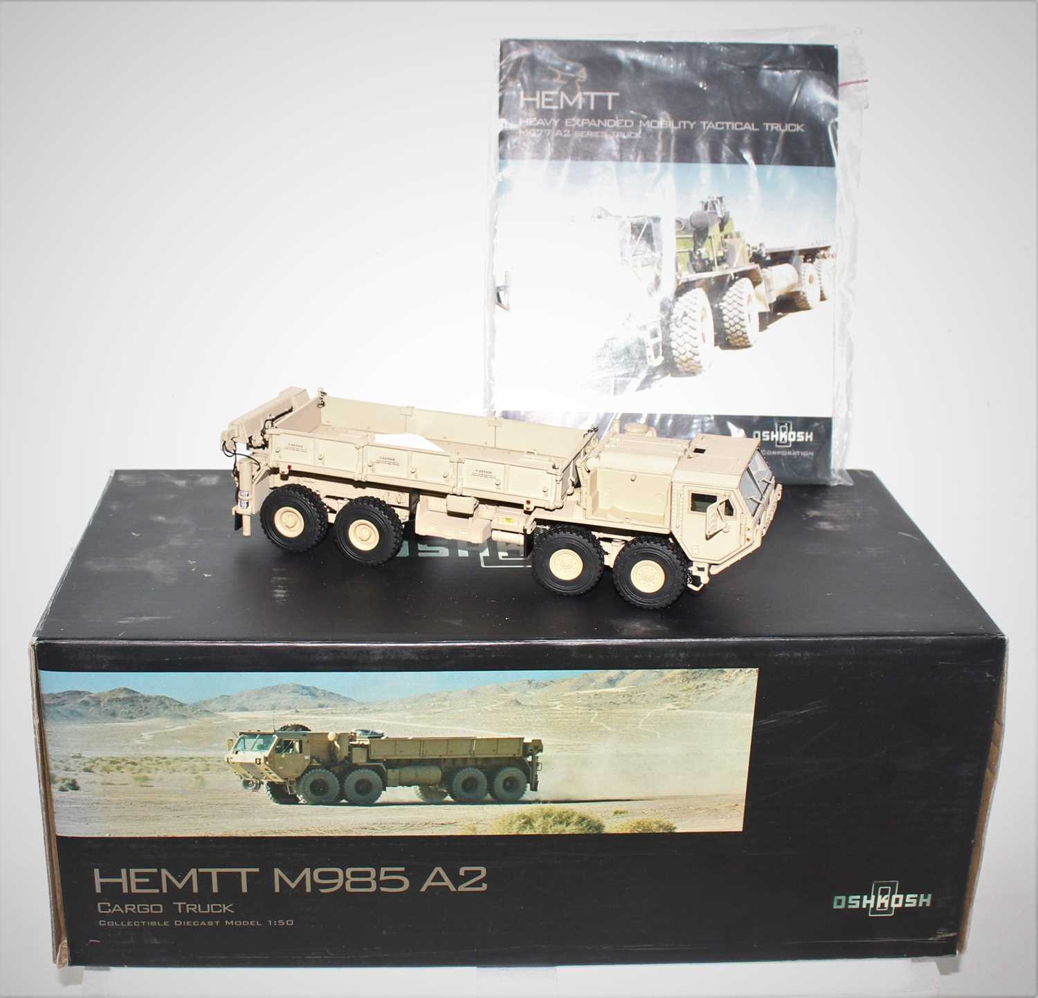 An Osh Kosh by TWH Collectables model No. TWH077 1/50 scale boxed diecast model of a Hemtt M985 A2