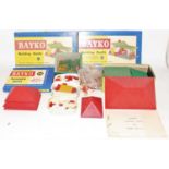 One box containing a collection of various boxed and loose Bayko to include various boxed