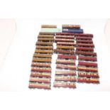 Forty Hornby Dublo tinplate coaches, all in poor condition and suitable for spares or repair, to