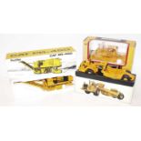 A 1/50 scale boxed Construction Vehicle diecast group, three examples to include a First Gear