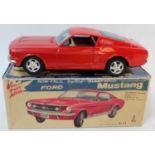 Taiyo Tinplate battery powered Ford Mustang (red) tiny rub mark to roof, very near mint in box. (