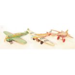 Three various tinplate and clockwork model aircraft to include a Marx Toys tinplate passenger