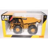 A Tonkin Replicas model No. TR30001 1/50 scale model of a Caterpillar MT4400D AC mining truck,