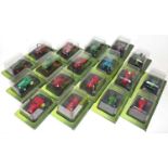 18 various plastic cased Hachette miniature scale diecast tractor models to include a Massey