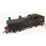 A 00 gauge white metal kit built model of a Wills flat iron 0-6-4T locomotive kit fitted with Triang