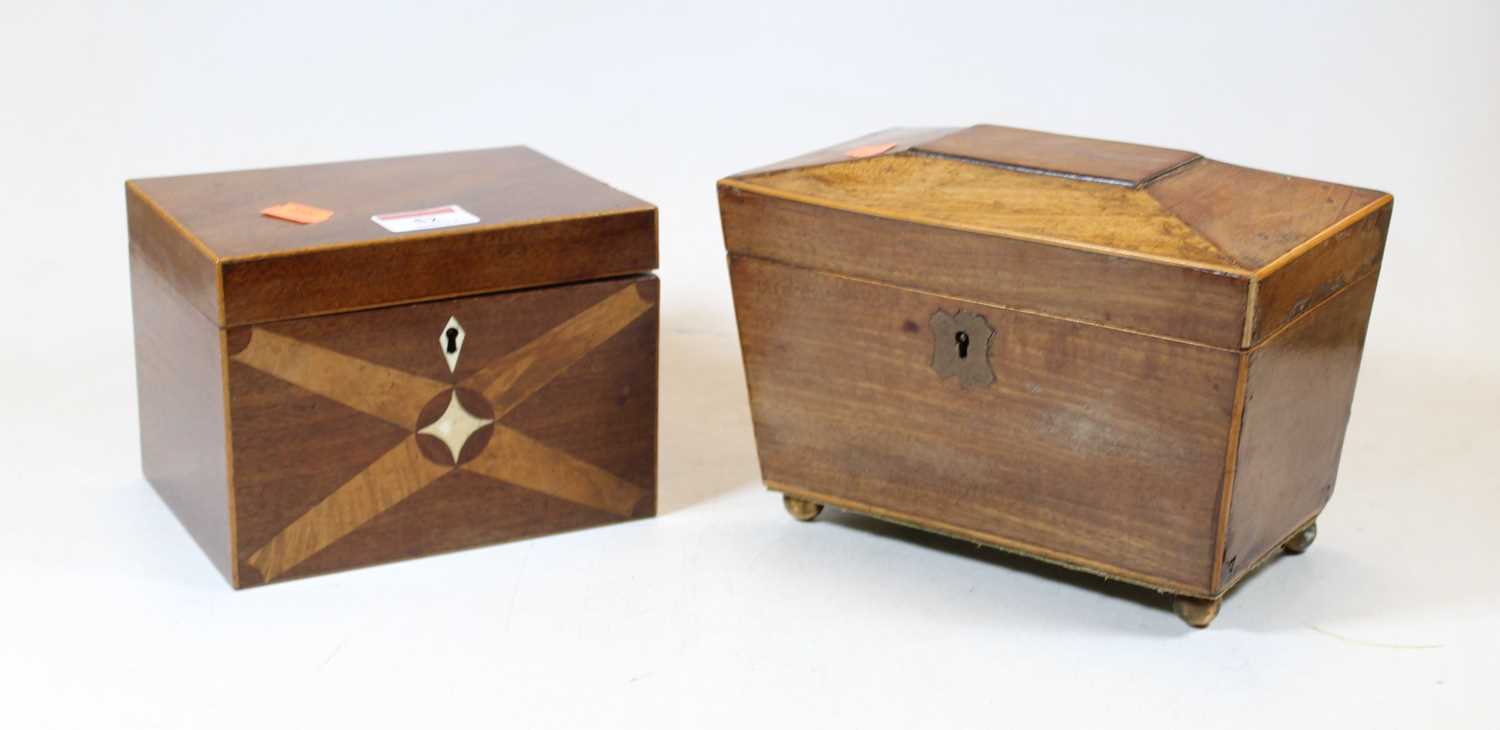 A Regency mahogany and boxwood strung tea caddy, of sarcophagus form, with brass escutcheon, the lid