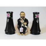 A Kevin Francis Ceramics Toby Jug depicting Pavorotti; together with a pair of Shelley black