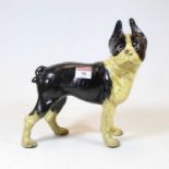 A painted cast iron model of a pug dog, shown in standing pose, 24cm high