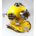 A reproduction American Navy yellow painted divers helmet, h.40cm