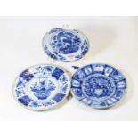 An 18th century Dutch Delft plate, having blue dash decoration, dia.23cm; together with two