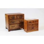 A mahogany apprentice chest of drawers, containing two short over two long drawers on ogee bracket