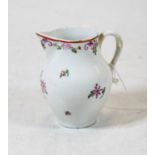An 18th century Lowestoft porcelain sparrow beak jug, with floral decoration (restored), height