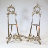 A pair of modern brass table easels in the Rococo style with rocaille and C-scroll decoration,