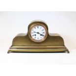 A late 19th century brass cased mantel clock, the enamelled dial showing Roman numerals, the eight-