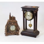 An early 20th century portico clock, the silvered dial showing Arabic numerals, 27cm high,