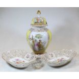 A pair of continental porcelain dishes, each with floral decoration 28cm wide, together with a