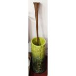 A late Victorian Burmantofts faience green glazed pottery stick-stand, relief decorated with leaves,