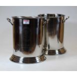 A pair of reproduction plated champagne buckets, each inscribed 'Louis Roederer 1776', h.24cm