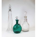 A 19th century triple ring neck cut glass decanter, 31cm high including stopper; together with a