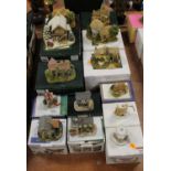 A collection of 13 Lilliput Lane models, to include Christmas Sparkle and The Toy-menders, the