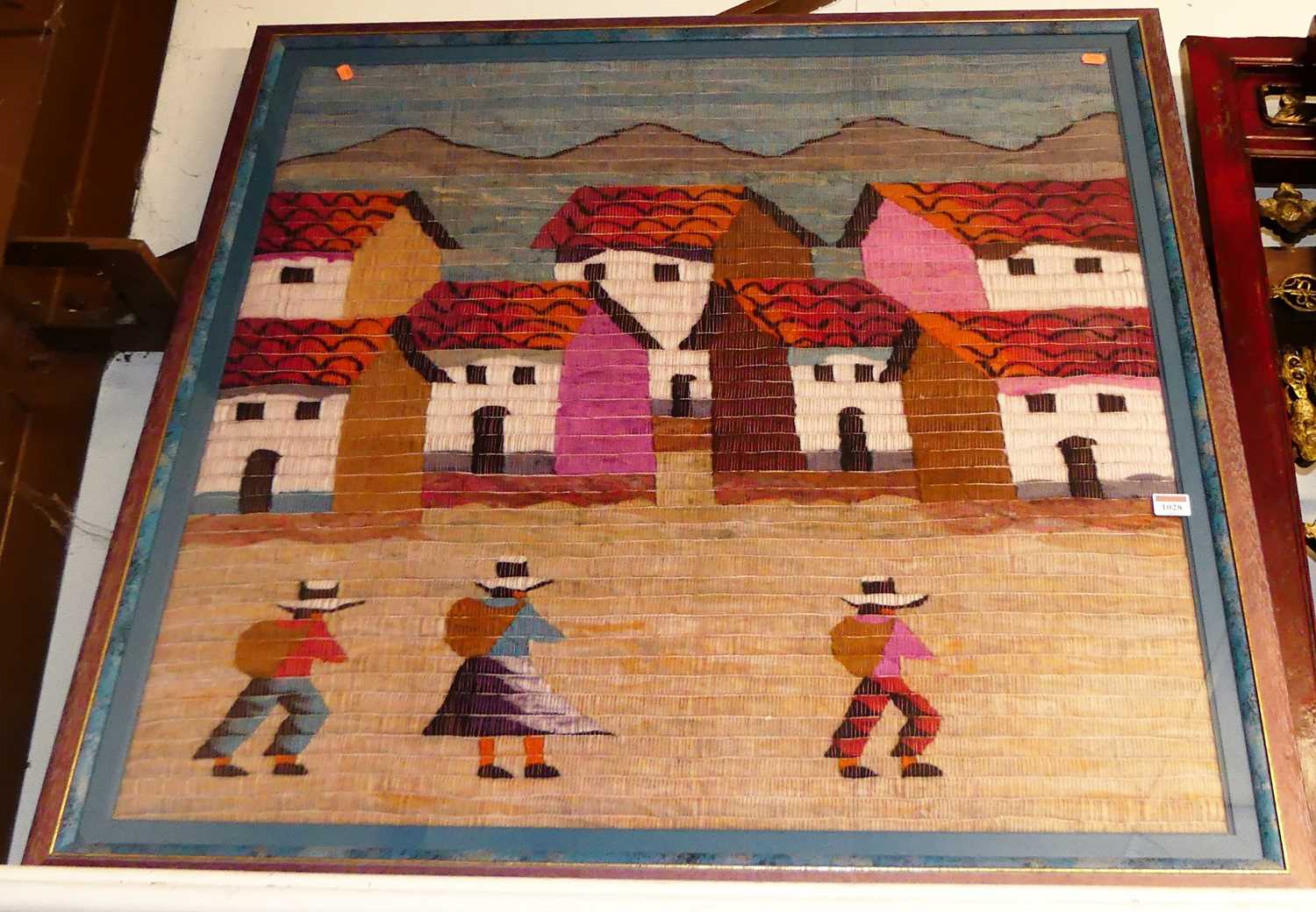 A large feltwork picture depicting a Central American theme, 90x90cm, in modern glazed frame