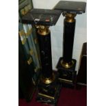 A pair of contemporary black variegated marble and gilt metal mounted pedestal torchere, h.104cm