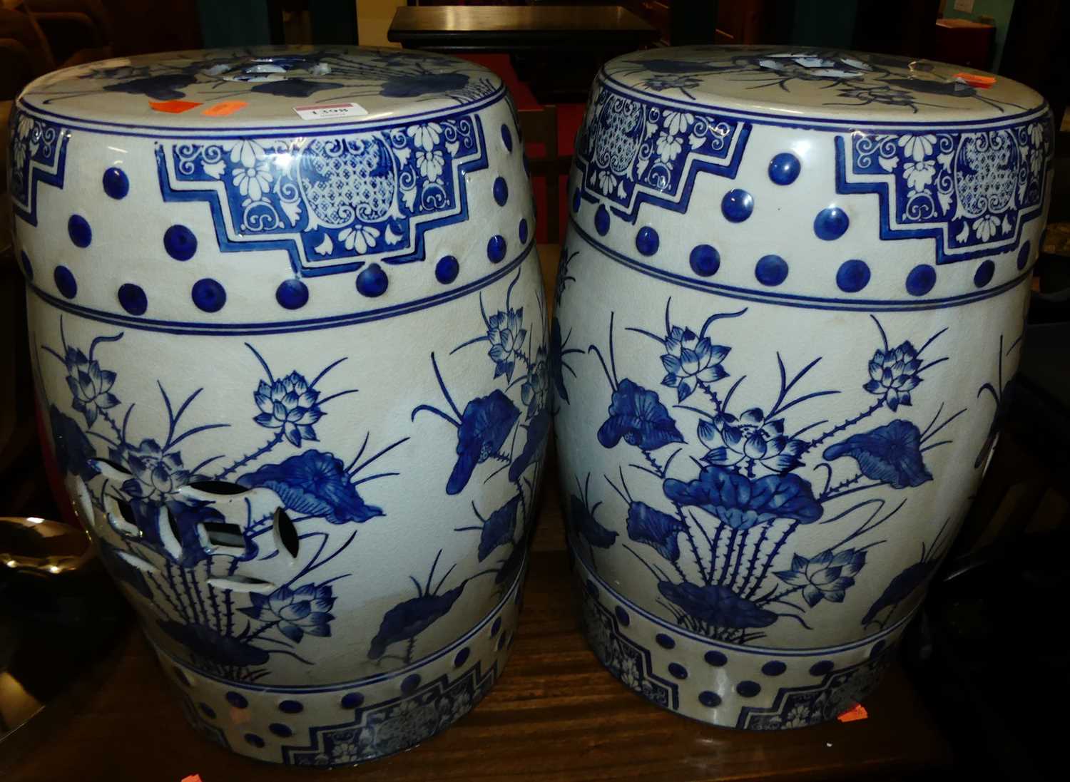 A pair of contemporary Chinese blue & white stoneware barrel shaped garden seats, height 44cm