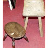 Two 19th century elm milking stoolsCondition report: Pine stool – h.34cm, w.26cm, d.26cm.Oak stool –