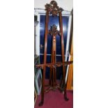 A reproduction carved hardwood artists easel, of good size, h.220cm