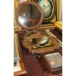 A walnut framed circular wall mirror, dia. 36cm, together with carved oak wall mirror, gilt metal