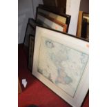 A collection of reproduction printed maps from around the world, all framed