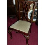 A set of twelve contemporary Chippendale style mahogany dining chairs, each having striped