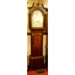 An early 19th century provincial oak and mahogany cross banded long case clock, the painted arch