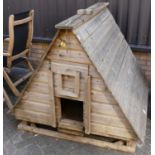 A boarded pine chicken coop, with rise and fall door, and further hinged side doorCondition