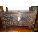 A Middle Eastern blind carved hardwood coffer, with hinged top