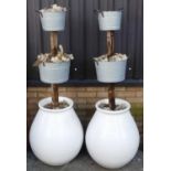 A pair of glazed stoneware, galvanised metal and wood three-tier freestanding planters, each