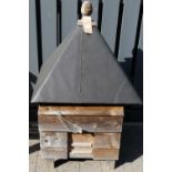 A boarded pine Duck house, with rise and fall door, height 108cm