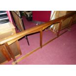 An ecclesiastical hardwood long altar rail, 76 x 250cm